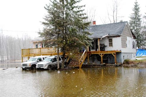 Temporary waterfront property on Elm Tree Road in Arden